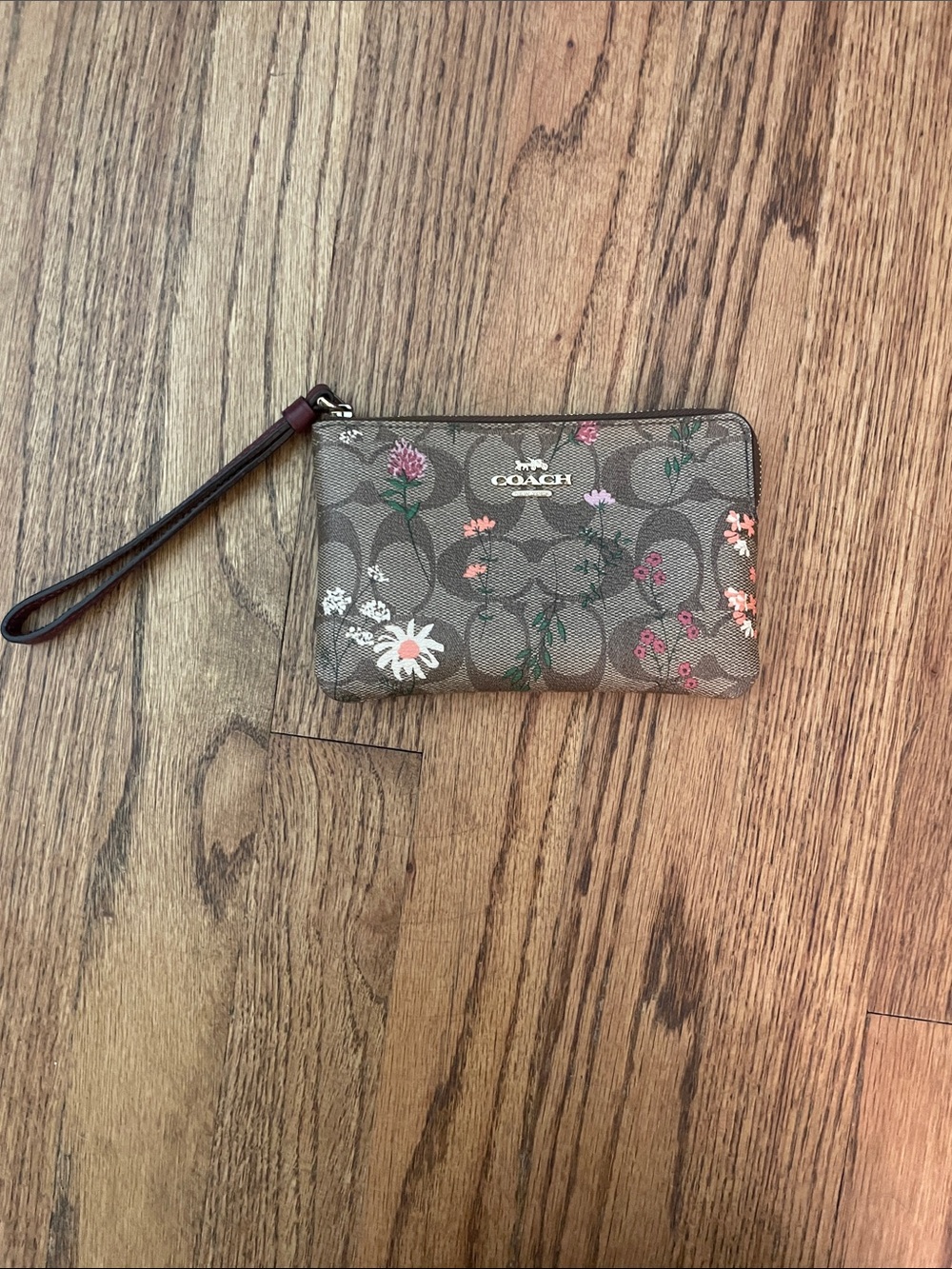Coach Corner Zip Wristlet In Signature Canvas With Wildflower Print